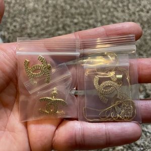 Gold platted Chanel necklace and earring set